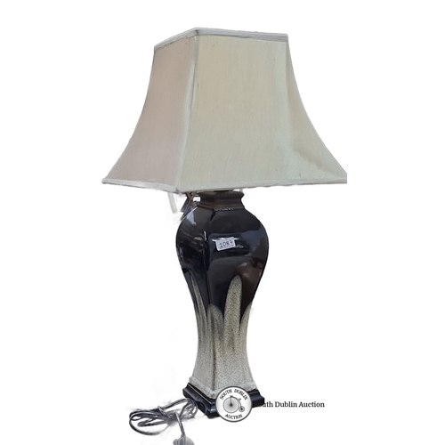 1087 - Kirkwood Distributors Ltd. ceramic table lamp, model GJ4. It has a textured glaze finish and cream l... 