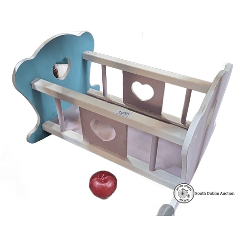 1090 - A Wooden doll cradle, pastel-colored with heart-shaped cutouts. Handmade, contemporary design.