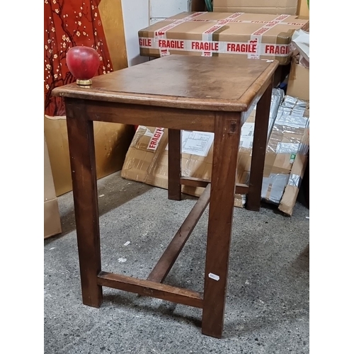 1262 - Rustic wooden side table with a simple design, crafted from oak or similar wood. From the early 20th... 