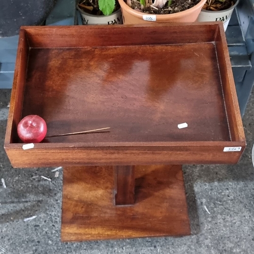 1267 - Star Lot : Mahogany side table with tray top features sturdy pedestal base and rich wood grain. Mid-... 