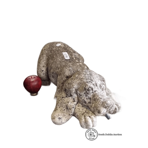 1275 - A Stone dog garden ornament with a rustic finish, depicting a dog.