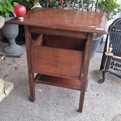 1279 - Star lot :An antique Mahogany drop-leaf side table with folding shelves. An unusual lot.