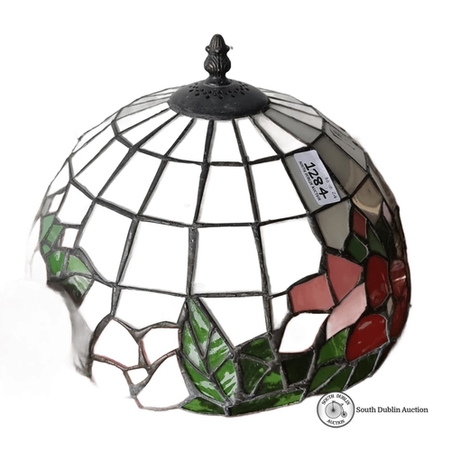 1284 - Stained glass lamp shade featuring floral motif with pink, red, and green detailing. It has a dome-s... 