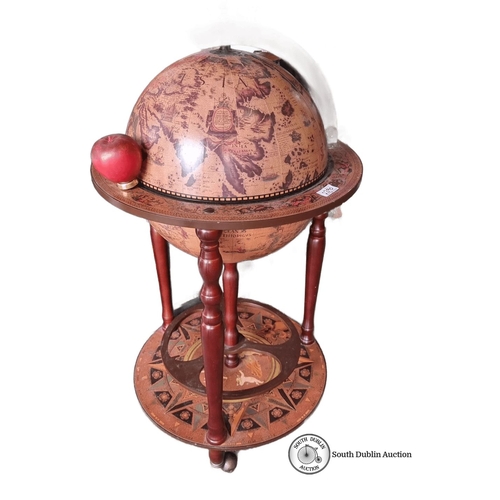 1290 - Bar globe drinks cabinet features a wooden stand, red accent finish, and vintage map design. The hin... 