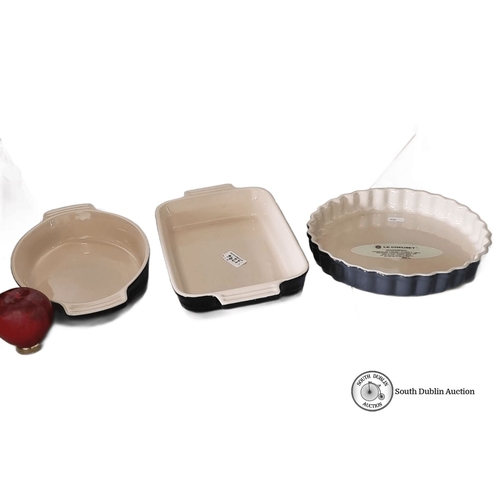 1296 - Star lot : Three brand new Le Creuset stoneware bakeware set includes a round, rectangular, and flut... 