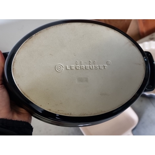 1296 - Star lot : Three brand new Le Creuset stoneware bakeware set includes a round, rectangular, and flut... 