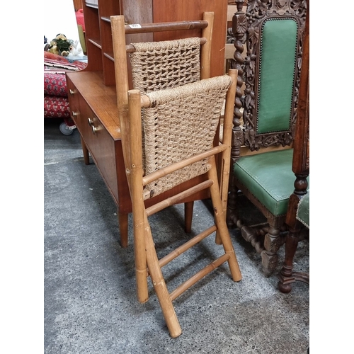 953 - Bamboo folding chair with a woven natural fiber seat, Mid-Century Modern design.