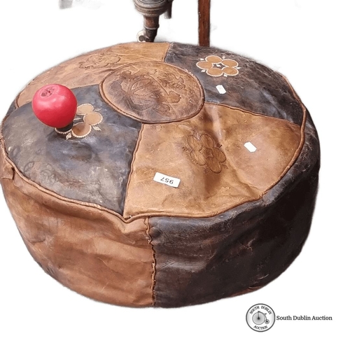 957 - Vintage leather pouf with decorative floral embroidery.