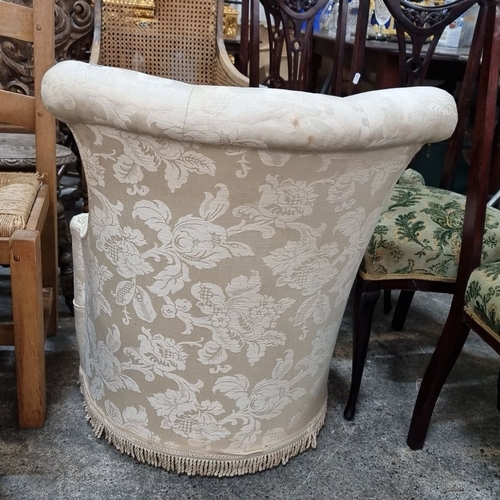 959 - Floral-patterned damask upholstered armchair with button tufting and fringe trim, from the mid-centu... 