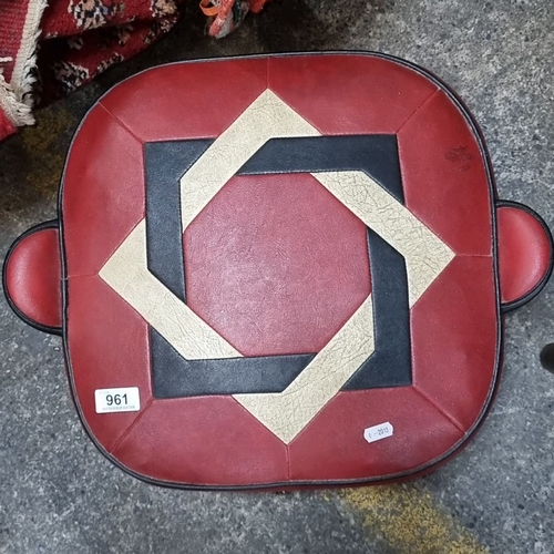 961 - Retro leather ottoman features a geometric pattern in red, black, and beige. It is square-shaped wit... 