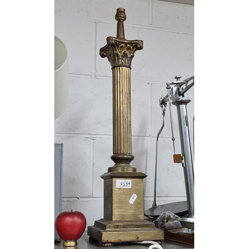 1139 - An antique tall, large and impressive beautiful solid brass column table lamp, made in Dublin by Eir... 