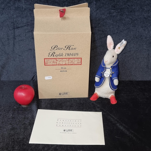 1212 - Star lot : A large 22cm  limited edition Steiff Peter Hase 2002 bear - no. 1769 / 3000. In original ... 