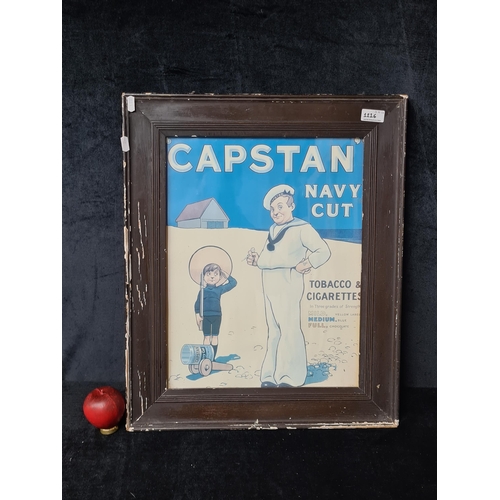 1216 - A print of an advertising poster for ' Capstan Navy cut Tobacco and cigarettes'. Housed in a wooden ... 