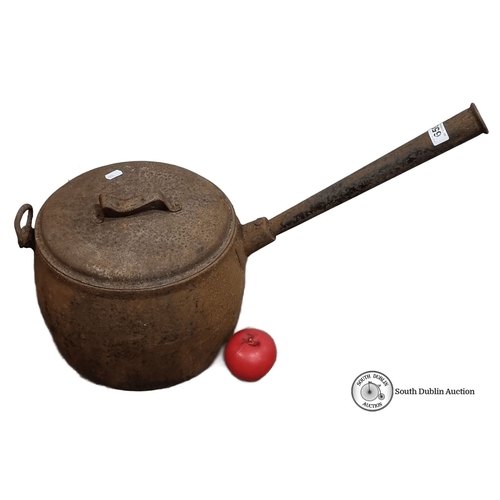 1322 - A large heavy cast iron kettle with long spout and lid. Rustic patina adds character.
Previous in au... 