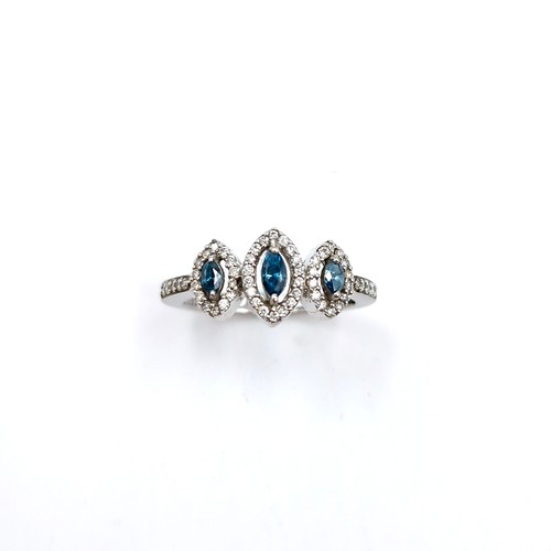 1354 - An outstanding 18 carat white gold marquis shaped blue and white brilliant cut diamond triple cluste... 