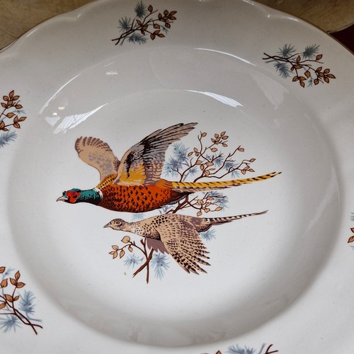 436 - 15 pieces of Arklow ceramic ware in the Pheasant pattern. Stamped to base.