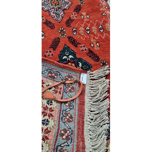 942 - Star lot : A lovely hand Knotted, hand made runner / rug  in red featuring a repetitve pattern with ... 