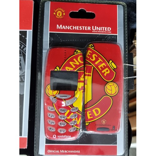 262 - A box containing wonderful selection of 'Manchester United' memorabilia. Includes stickers, keychain... 