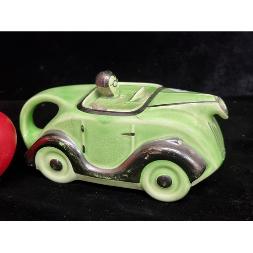 270 - A rare Sadler's Ceramic Tea Pot in the form of Great James Racing Car. Features a soft green colour ... 