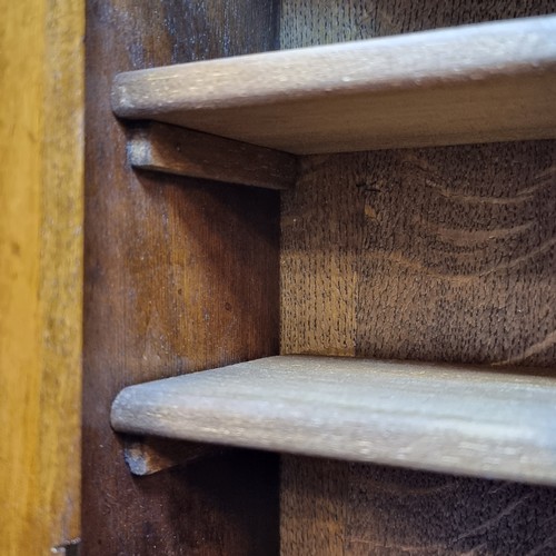 294 - A fabulous vintage counter / table top wooden cabinet featuring two doors to front opening to reveal... 