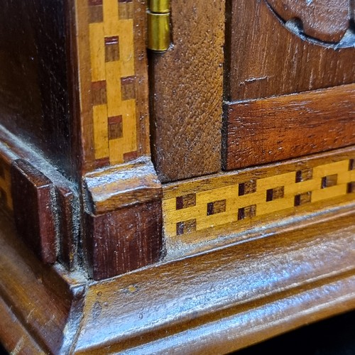 294 - A fabulous vintage counter / table top wooden cabinet featuring two doors to front opening to reveal... 