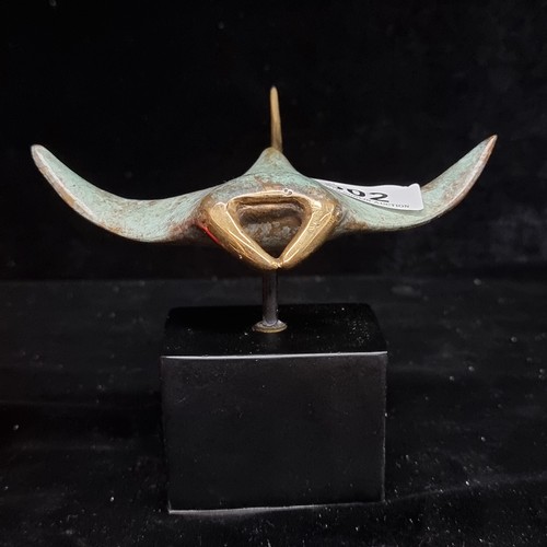 302 - Star Lot : A fabulous bronze sculpture of a manta ray mounted on a matte black plinth. Beautiful det... 