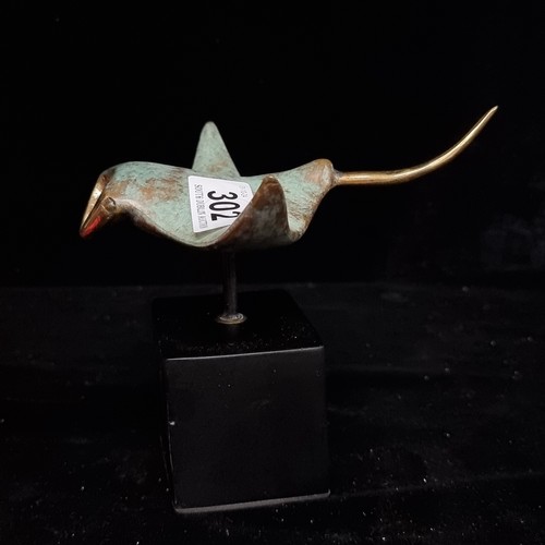 302 - Star Lot : A fabulous bronze sculpture of a manta ray mounted on a matte black plinth. Beautiful det... 