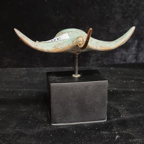 302 - Star Lot : A fabulous bronze sculpture of a manta ray mounted on a matte black plinth. Beautiful det... 