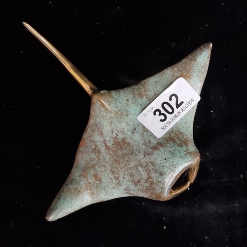 302 - Star Lot : A fabulous bronze sculpture of a manta ray mounted on a matte black plinth. Beautiful det... 