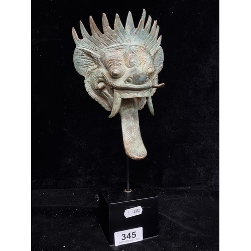 345 - Star lot : An unusual Barong bronze sculpture mounted on a plinth base with green Patina, lovely qua... 