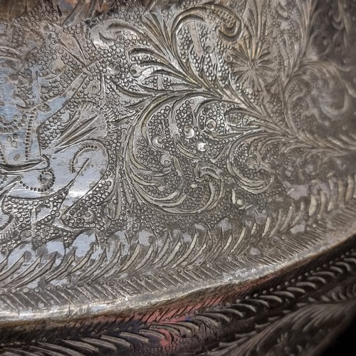 346 - A wonderful large Middle Eastern handmade engraved etched bowl boasting incredible detailed images a... 