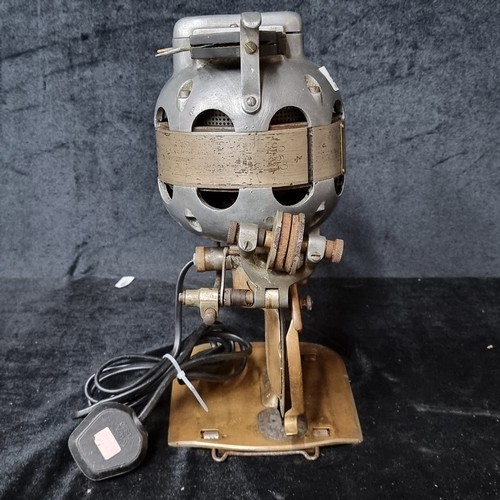 1151 - An unusual vintage Ballard Electric cloth cutter converted into a desk lamp.