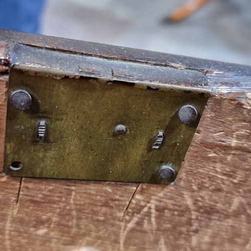 811 - An antique chest of drawers with five drawers with turned wood handles, missing two.