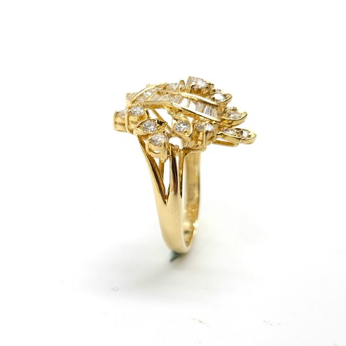 2 - Super Star Lot : A fabulous 18 carat yellow gold spray diamond ring set with 19 Assorted brilliant c... 