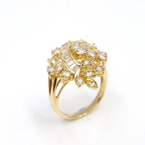 2 - Super Star Lot : A fabulous 18 carat yellow gold spray diamond ring set with 19 Assorted brilliant c... 