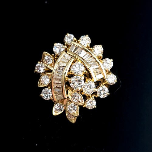 2 - Super Star Lot : A fabulous 18 carat yellow gold spray diamond ring set with 19 Assorted brilliant c... 