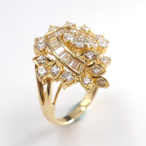 2 - Super Star Lot : A fabulous 18 carat yellow gold spray diamond ring set with 19 Assorted brilliant c... 