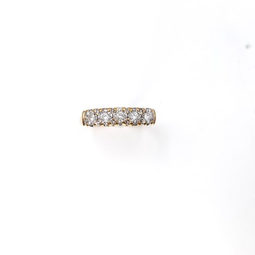 6 - Star Lot : A very bright five stone diamond ring set in nine carat gold (375). Est total weight of d... 