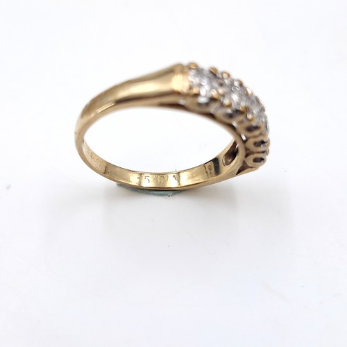 6 - Star Lot : A very bright five stone diamond ring set in nine carat gold (375). Est total weight of d... 