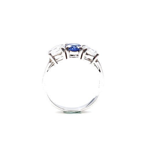 27 - An attractive three stone zirconia stone ring set in sterling silver. Size - U. Weight - 5.22 grams.