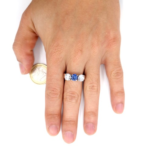 27 - An attractive three stone zirconia stone ring set in sterling silver. Size - U. Weight - 5.22 grams.