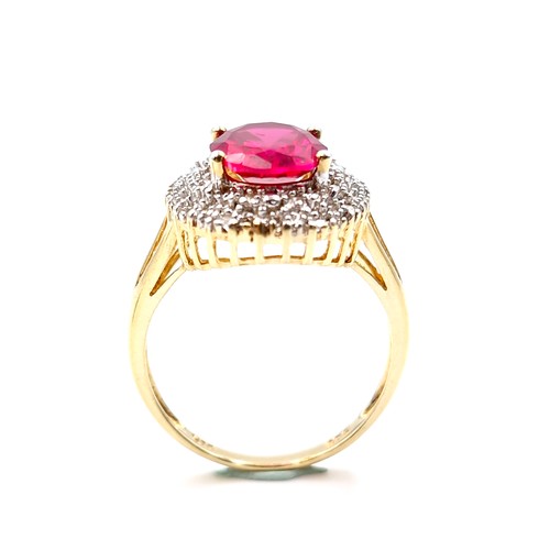 29 - Star Lot : A fabulous example of a central ruby stone ring with diamond cluster mount set in silver ... 