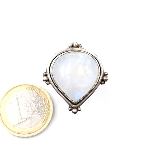 32 - A very pretty heavy heart shaped moonstone ring set in sterling silver. Ring size - Q. Weight - 11.2... 