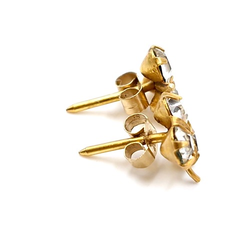 40 - A pair of nine carat gold gem set shamrock designed stud earrings. Total weight - 0.70 grams.