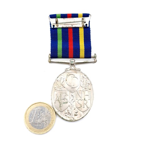 73 - An AFS/NHS boxed service medal. As per photographed.