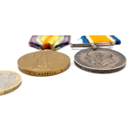 75 - Two 1914 - 1919 great war medals. Together with original ribbons. Both presented to 55073 PTE H.S Ma... 