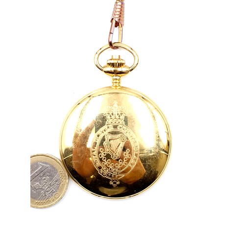 83 - A full hunter quartz pocket watch with Ulster Constabulary inscription to case with watch holder and... 