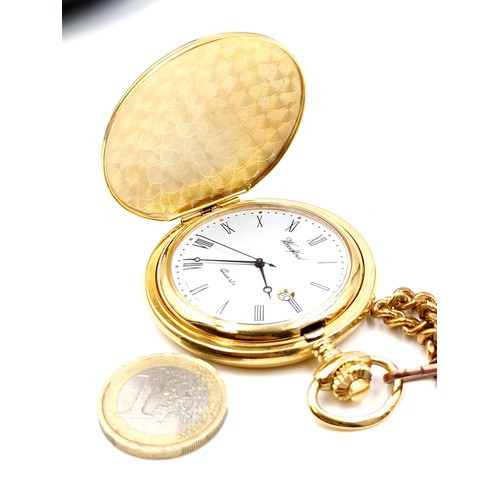 83 - A full hunter quartz pocket watch with Ulster Constabulary inscription to case with watch holder and... 