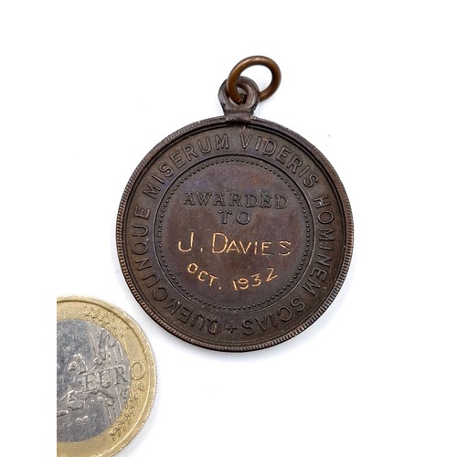 84 - A Royal Society life saving medal awarded to J. Davies, Oct 1932. Comes in original presentation cas... 