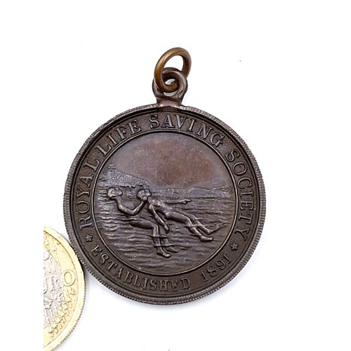 84 - A Royal Society life saving medal awarded to J. Davies, Oct 1932. Comes in original presentation cas... 